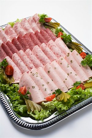 platter with cold meat - Attractively arranged cold cuts platter Stock Photo - Premium Royalty-Free, Code: 659-01865105
