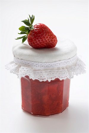 Jar of strawberry jam with a fresh strawberry Stock Photo - Premium Royalty-Free, Code: 659-01865138