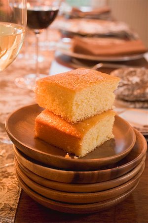 Cornbread on table laid for Thanksgiving (USA) Stock Photo - Premium Royalty-Free, Code: 659-01865197