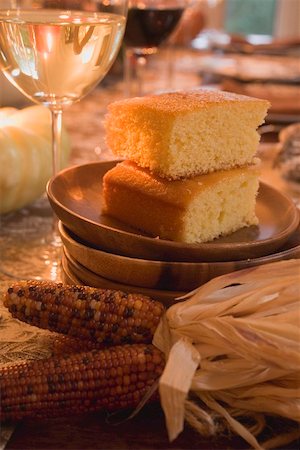 Cornbread on table laid for Thanksgiving (USA) Stock Photo - Premium Royalty-Free, Code: 659-01865198