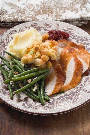 simsearch:659-02213767,k - Turkey breast with green beans, bread stuffing & mashed potato Stock Photo - Premium Royalty-Free, Code: 659-01865264