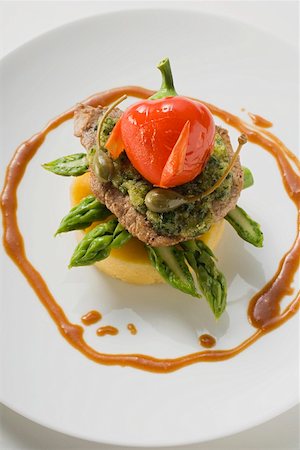 simsearch:659-01857570,k - Escalope with herbs, capers, pepper & asparagus on polenta Foto de stock - Sin royalties Premium, Código: 659-01865291