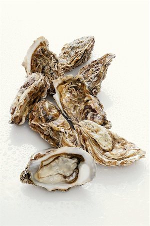 raw oyster - Fresh oysters with drops of water Stock Photo - Premium Royalty-Free, Code: 659-01865307