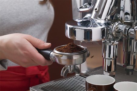 espresso machine - Woman holding filter holder Stock Photo - Premium Royalty-Free, Code: 659-01865405