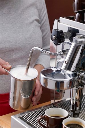 preparing cappucino - Frothing milk with espresso machine Stock Photo - Premium Royalty-Free, Code: 659-01865414