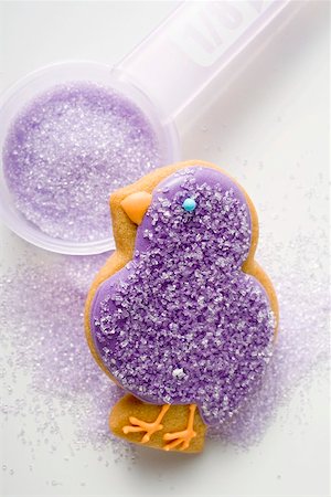 decorated dishes chicken - Easter biscuit (purple chick) and sugar for decorating Stock Photo - Premium Royalty-Free, Code: 659-01865455