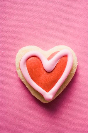 Heart-shaped iced biscuit Foto de stock - Sin royalties Premium, Código: 659-01865489