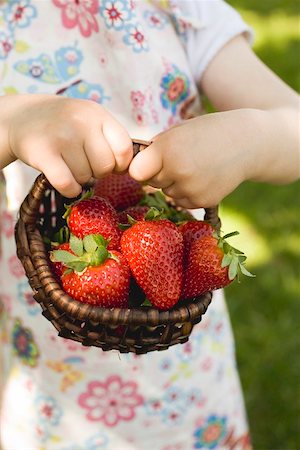 simsearch:659-01864546,k - Child's hands holding basket of fresh strawberries Stock Photo - Premium Royalty-Free, Code: 659-01865663