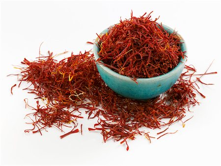 saffron - Saffron threads, in and around blue bowl Stock Photo - Premium Royalty-Free, Code: 659-01865732