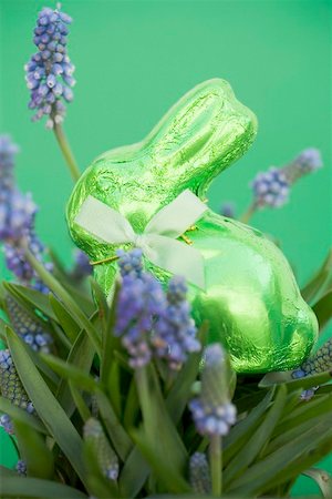 foil chocolate bunnies - Green Easter Bunny among spring flowers Stock Photo - Premium Royalty-Free, Code: 659-01865795