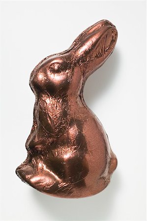 foil chocolate bunnies - Chocolate bunny in brown foil Stock Photo - Premium Royalty-Free, Code: 659-01865942