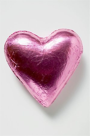 simsearch:659-01864461,k - Chocolate heart in pink foil Stock Photo - Premium Royalty-Free, Code: 659-01865965