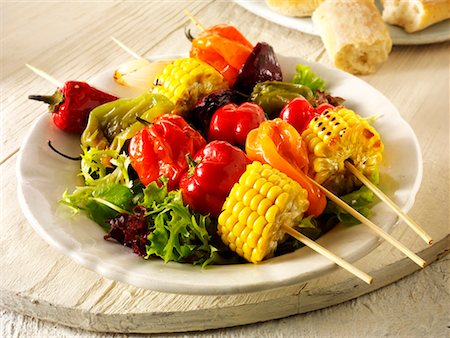 Colourful vegetable kebabs on salad leaves Stock Photo - Premium Royalty-Free, Code: 659-01866058