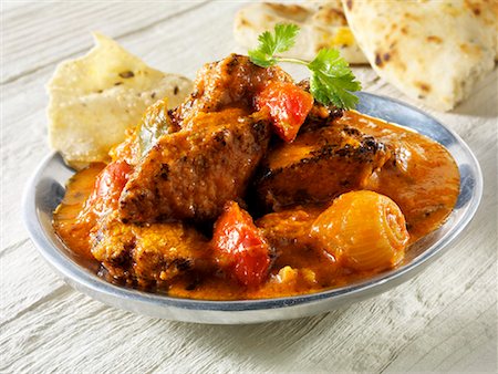 Jalfrezi (spicy meat curry, India), with flatbread Foto de stock - Sin royalties Premium, Código: 659-01866120