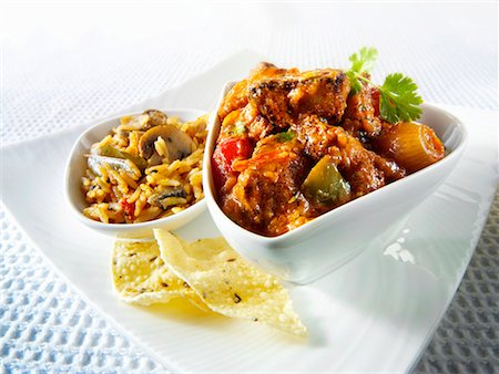 rice with stew - Jalfrezi (spicy meat curry, India) with rice Stock Photo - Premium Royalty-Free, Code: 659-01866121