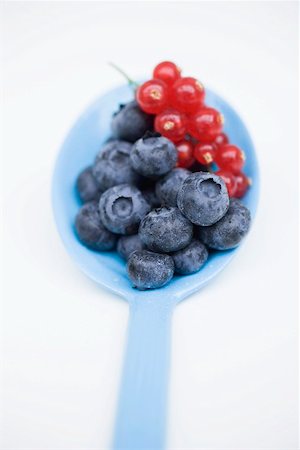 simsearch:659-08940030,k - Blueberries and redcurrants on blue spoon Stock Photo - Premium Royalty-Free, Code: 659-01866294