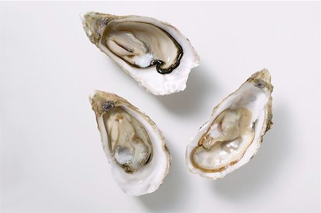 raw oyster - Fresh oysters, opened Stock Photo - Premium Royalty-Free, Code: 659-01866387