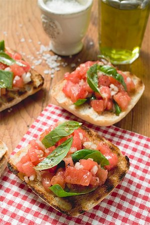 simsearch:659-03525182,k - Bruschetta with tomato salsa and basil Stock Photo - Premium Royalty-Free, Code: 659-01866453