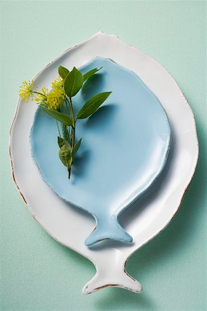 White and blue fish plates, decorated with herbs Stock Photo - Premium Royalty-Free, Code: 659-01866483