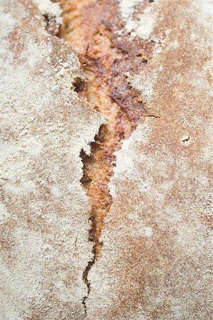 farmhouse bread - Rustic bread (detail) Foto de stock - Sin royalties Premium, Código: 659-01866604