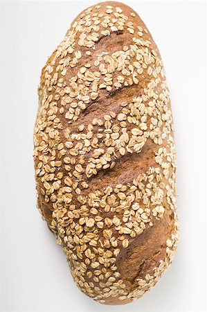 simsearch:659-01866634,k - Wholemeal bread with rolled oats Foto de stock - Sin royalties Premium, Código: 659-01866653