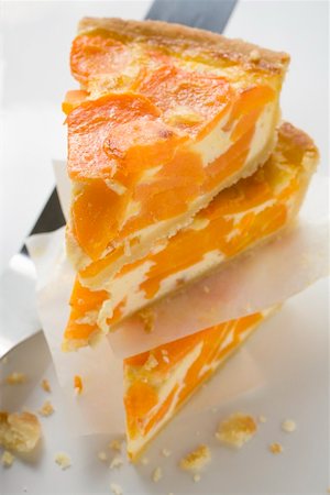 Three pieces of apricot cheesecake Stock Photo - Premium Royalty-Free, Code: 659-01866666