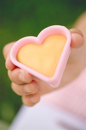 simsearch:659-06188554,k - Child holding cut-out biscuit Stock Photo - Premium Royalty-Free, Code: 659-01866722