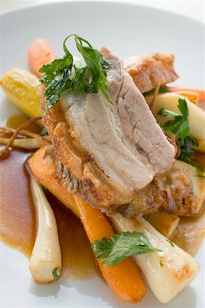 simsearch:659-03524144,k - Roast belly pork with crackling and root vegetables Stock Photo - Premium Royalty-Free, Code: 659-01867006