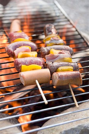 simsearch:659-01867128,k - Sausage and pepper kebabs on barbecue Stock Photo - Premium Royalty-Free, Code: 659-01867128