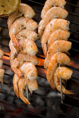 simsearch:659-01867128,k - Prawn kebabs on barbecue grill rack Stock Photo - Premium Royalty-Free, Code: 659-01867166