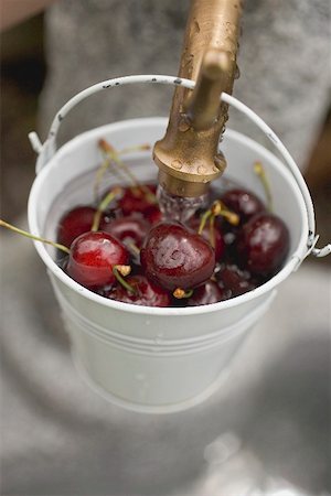 simsearch:659-01867277,k - Washing cherries in bucket under tap Stock Photo - Premium Royalty-Free, Code: 659-01867271