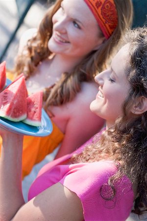 simsearch:659-02212589,k - Two young women with wedges of watermelon Stock Photo - Premium Royalty-Free, Code: 659-01867611