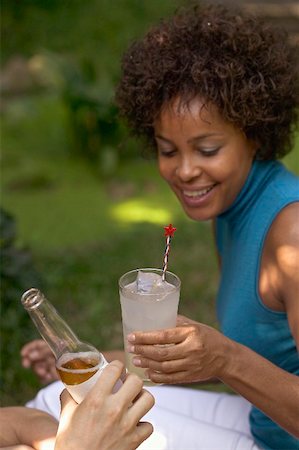 simsearch:659-03531318,k - Woman with a glass of lemonade at a garden party Stock Photo - Premium Royalty-Free, Code: 659-01867646