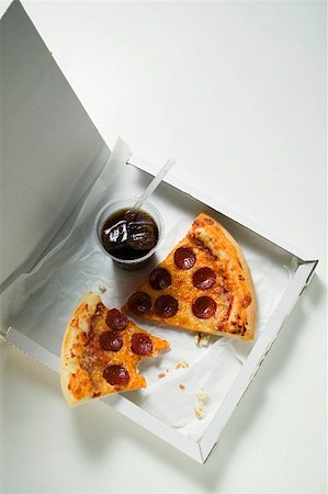 pepperoni overhead - Slices of American-style pepperoni pizza with cola Stock Photo - Premium Royalty-Free, Code: 659-01860320