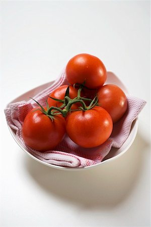 simsearch:659-03536260,k - Fresh tomatoes in white bowl Stock Photo - Premium Royalty-Free, Code: 659-01860458