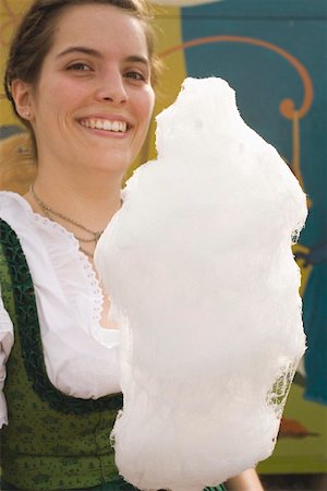 selling candy - Woman holding candyfloss (Oktoberfest, Munich) Stock Photo - Premium Royalty-Free, Code: 659-01860674