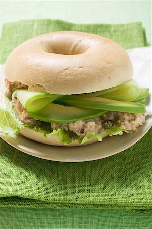 sandwich with avocado - Bagel filled with avocado, tuna salad and capers Stock Photo - Premium Royalty-Free, Code: 659-01860913