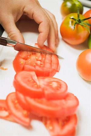 Dicing tomato Stock Photo - Premium Royalty-Free, Code: 659-01860970