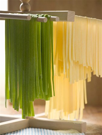 spinach pasta - Home-made ribbon pasta hanging up to dry Stock Photo - Premium Royalty-Free, Code: 659-01861296