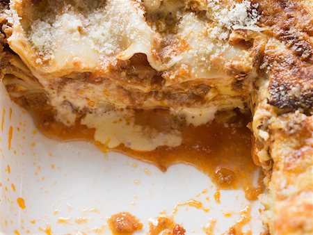 Mince lasagne, a portion taken (close-up) Stock Photo - Premium Royalty-Free, Code: 659-01861292