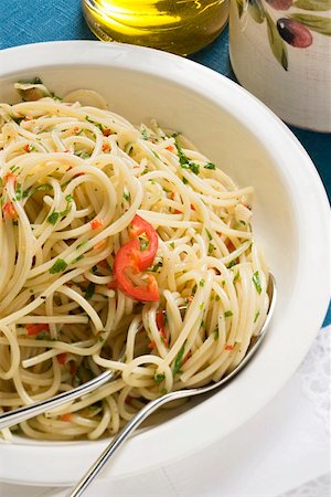 simsearch:700-01111927,k - Spaghetti with chillies and herbs olive oil Stock Photo - Premium Royalty-Free, Code: 659-01861305