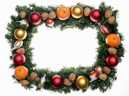 simsearch:659-03524961,k - Fir sprigs, baubles and nuts forming a Christmas frame Foto de stock - Sin royalties Premium, Código: 659-01861395