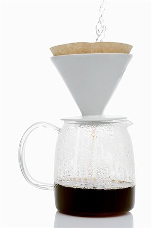 filtered - Making filter coffee (pouring hot water onto coffee) Stock Photo - Premium Royalty-Free, Code: 659-01861405