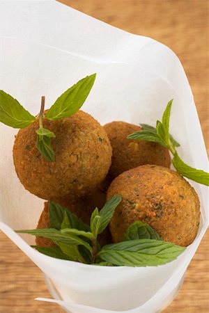 Falafel (chick-pea balls) with fresh mint Stock Photo - Premium Royalty-Free, Code: 659-01861422