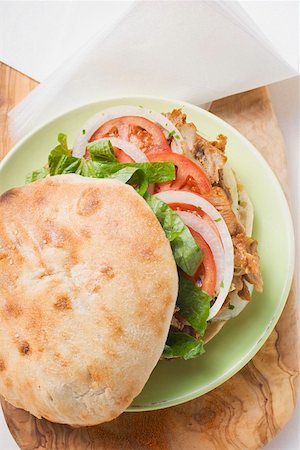 sandwich top view - Döner kebab on plate (overhead view) Stock Photo - Premium Royalty-Free, Code: 659-01861452