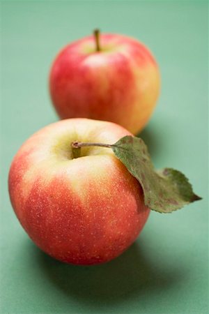 simsearch:659-06184226,k - Two Elstar apples, one with leaf Stock Photo - Premium Royalty-Free, Code: 659-01861527