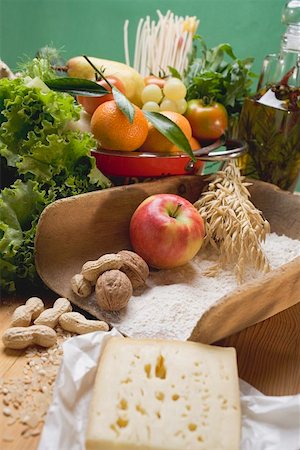 Fresh vegetables, fruit, nuts, flour, cheese and olive oil Stock Photo - Premium Royalty-Free, Code: 659-01861561