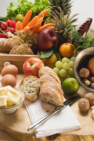 Still life with vegetables, fruit eggs, butter, nuts, baguette Stock Photo - Premium Royalty-Free, Code: 659-01861618