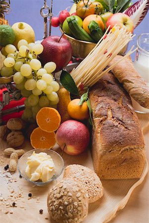 Fresh vegetables, fruit, butter, nuts and wholemeal bread Stock Photo - Premium Royalty-Free, Code: 659-01861626