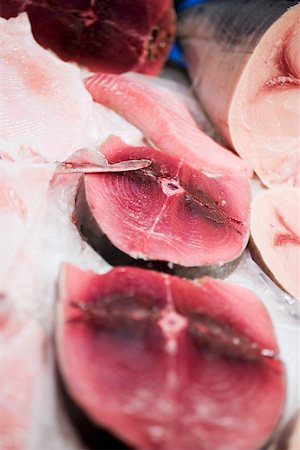 pescivendolo (negozio) - Fresh tuna steaks on ice Fotografie stock - Premium Royalty-Free, Codice: 659-01861707